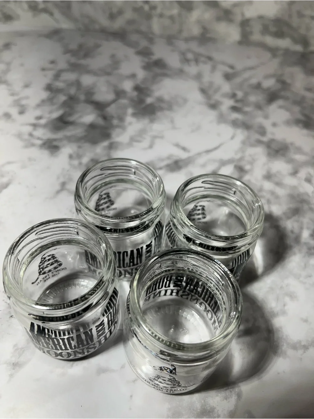Set of 4 Clear Glass Shot Jars with Black Logo